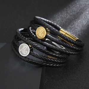 Multi-layer braided leather bracelet with stainless steel round charm featuring Kanji