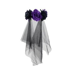 Detail of gothic rose headband with dark purple fabric flowers and black mesh veil