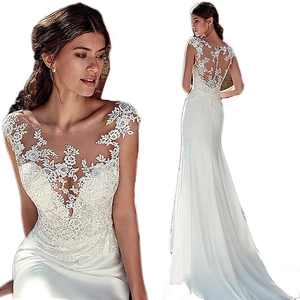 Elegant white lace mermaid wedding dress with sheer bodice and long satin train for women