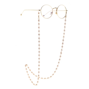 Golden eyewear chain with 6mm white pearls and round frame glasses on white background