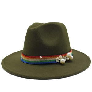 Detail of olive green wool fedora hat with rainbow ribbon and white pearl accents