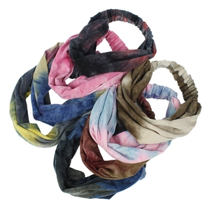 Close-up of assorted tie-dye elastic yoga headbands with soft pleated fabric texture