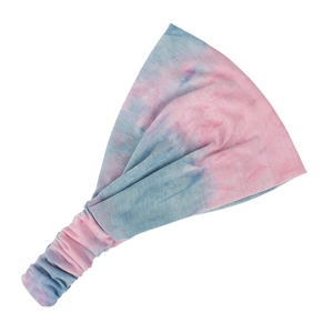 Detail of blue and pink tie-dye elastic yoga headband showing soft fabric texture