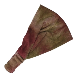Close-up of wide tie-dye yoga headband in vintage earthy brown and olive green tones