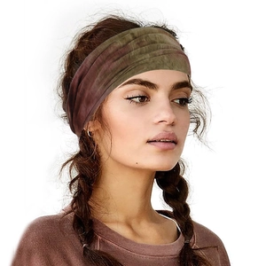Close-up of a stylish tie-dye elastic yoga headband shown on a female model with braids