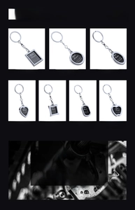 Detailed grid view of assorted silver metal keychain frames in various geometric shapes