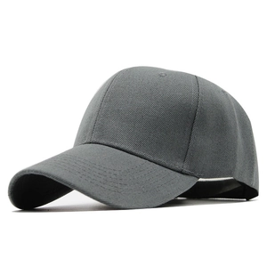 Close-up of the cotton twill fabric and reinforced stitching on a dark gray baseball cap