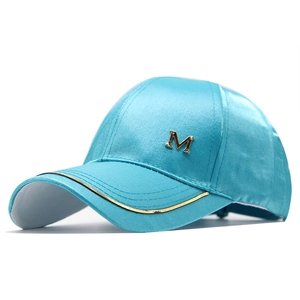 Women's sky blue satin baseball cap with golden M logo and striped brim detail