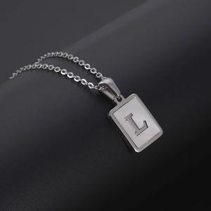 Silver square shell necklace featuring a minimalist engraved letter L pendant