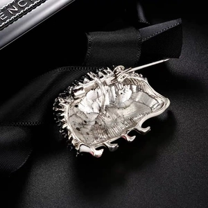 Rear view of a cute hedgehog animal brooch with secure silver pin buckle closure
