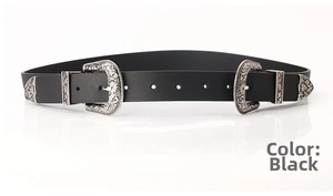 Detail of western style black leather belt featuring double vintage engraved silver buckles