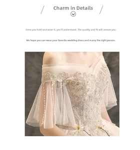 Detailed embroidery and sequins on off-shoulder ivory wedding dress with mesh sleeves