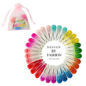 Candy-colored metal BB clips set with gradient sequins and a pink drawstring bag