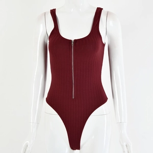 Close-up detail of burgundy ribbed bodysuit featuring a functional silver front zipper