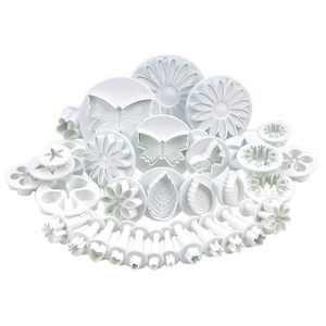 Comprehensive 33-piece white plastic fondant and cookie cutter set with floral patterns