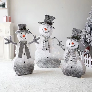Three-piece set of glowing flocked snowmen with LED warm white lights for Christmas decor