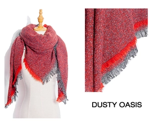 Macro view of red and gray knit shawl texture and dense fringe detail for autumn