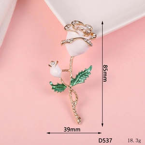 Detail showing 85mm rose flower brooch dimensions with white enamel and rhinestones