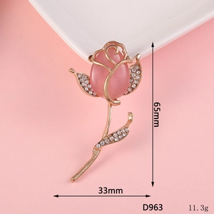 Macro shot of tulip flower brooch with pink cat's eye stone and size 65mm x 33mm
