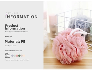 Pink PE bath sponge detail featuring fine mesh texture and white cotton hanging rope