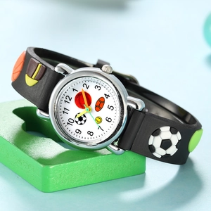 Kids sports watch with 3D soccer embossed strap and quartz dial on blue background