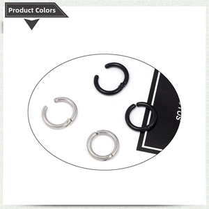 Detailed view of stainless steel hinged hoop earrings in black and silver finishes