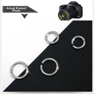 Polished silver titanium steel hoop earrings set with hinged segments for ear or lip
