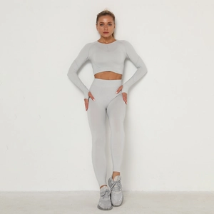 Detail view of seamless yoga set featuring thumb holes and high waist compression fabric