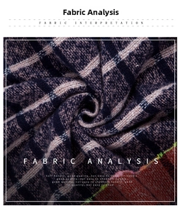 Close-up of soft plaid knit texture on hooded poncho with premium fleece finish