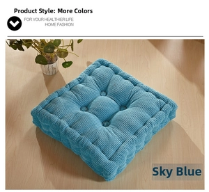 Close-up of water blue quilted floor cushion with soft corduroy fabric and 9-hole design