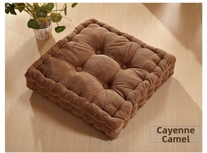 Close-up of cayenne camel corduroy chair pad with nine-point tufted texture and thick padding