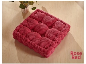 Detail of rose red thickened corn fleece square chair cushion with nine-hole tufted design