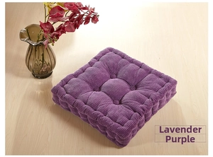 Macro detail of lavender corduroy chair cushion texture with decorative tufted buttons