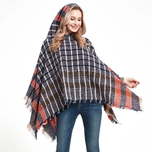 Women's plaid hooded poncho with fringe hem in navy blue and red checked pattern
