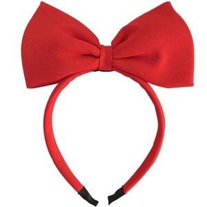Close-up of the bright red satin bow headband for girls on a clean white background