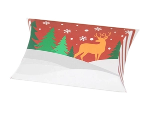 Close-up of a red Christmas pillow candy box with festive reindeer and tree patterns