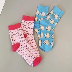 Funny blue and pink crew socks with creative cartoon body patterns for adults