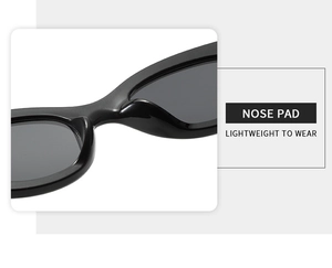 Detail of ergonomic integrated nose pads on black cat-eye sunglasses for comfortable wear