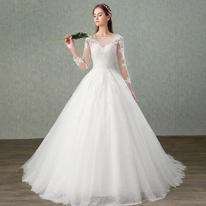 Elegant white lace wedding dress with long sleeves and off-the-shoulder slim fit design