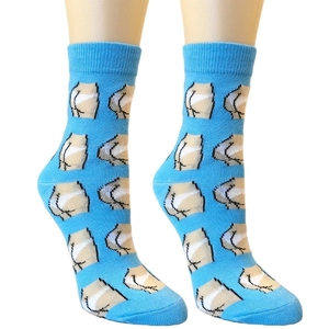 Sky blue crew socks with funny pixel art patterns shown on a model's legs