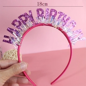Pink Happy Birthday headband with purple glitter letters and silver tassels for parties