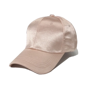 Pink satin finish baseball cap for women with high gloss texture and classic 45-degree angle view