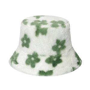 Winter plush bucket hat featuring a white base with green floral patterns for warmth