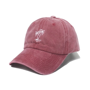 Distressed burgundy washed cotton baseball cap with white coconut tree embroidery detail