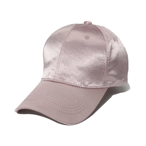 Pale pink silk satin baseball cap for women with smooth glossy finish and minimalist design