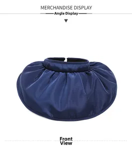 Front view of a dark blue wide-brim sun hat with elegant pleated fabric detail
