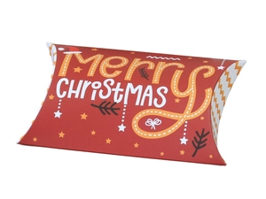 Red Christmas pillow gift box with white and gold Merry Christmas lettering on white background