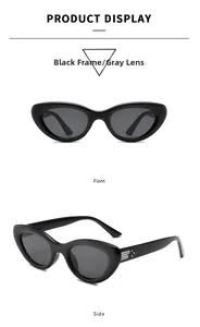 Detail of black cat-eye sunglasses featuring silver metal accents on the side temple