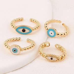 Minimalist evil eye rings in gold finish with blue enamel and sparkling rhinestones