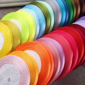 Rolls of colorful 6mm satin ribbon with gold trim for hair accessories and gift wrapping